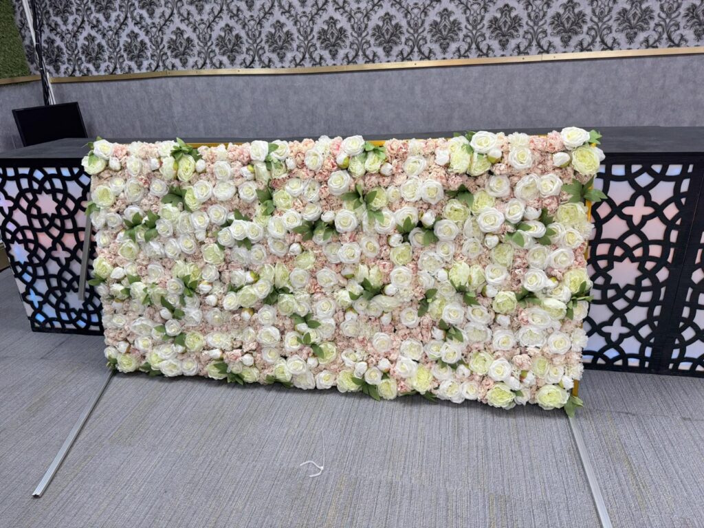 Artificial rose flower wall decoration at Baab-e-Salaam wedding venue